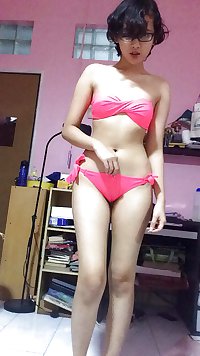 Girl with Pink Bikini Teasing And Masturbating